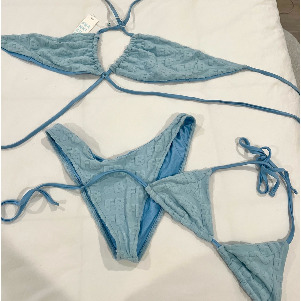 Blue Frankies bikini set with 2 tops included. New with Tags.